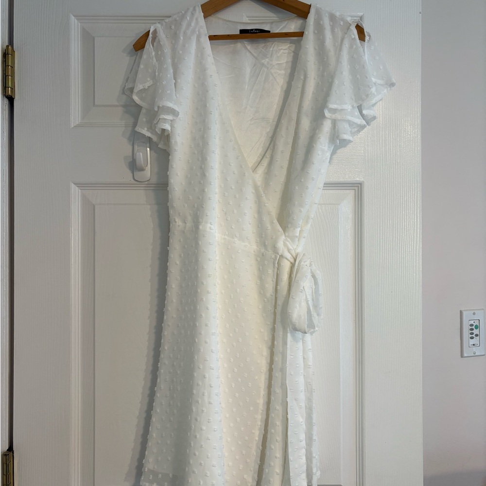 White wrap dress, above knee length. Graduation/bachelorette/confirmation